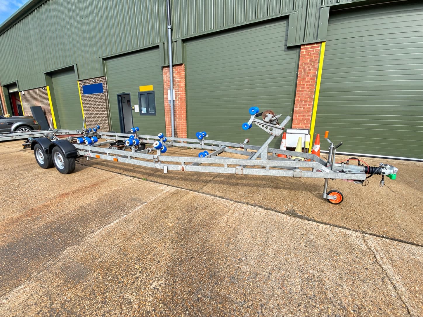 Twin-axle boat trailer outside the C&B workshop